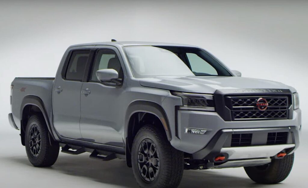 A modern pickup truck showcased in a studio setting