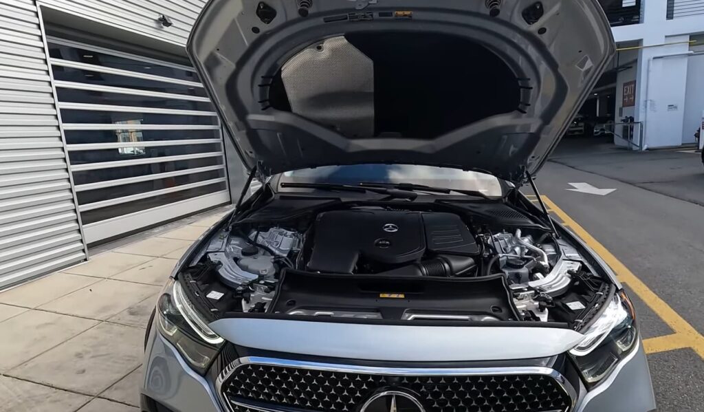 Front view of a Mercedes engine bay with the hood open